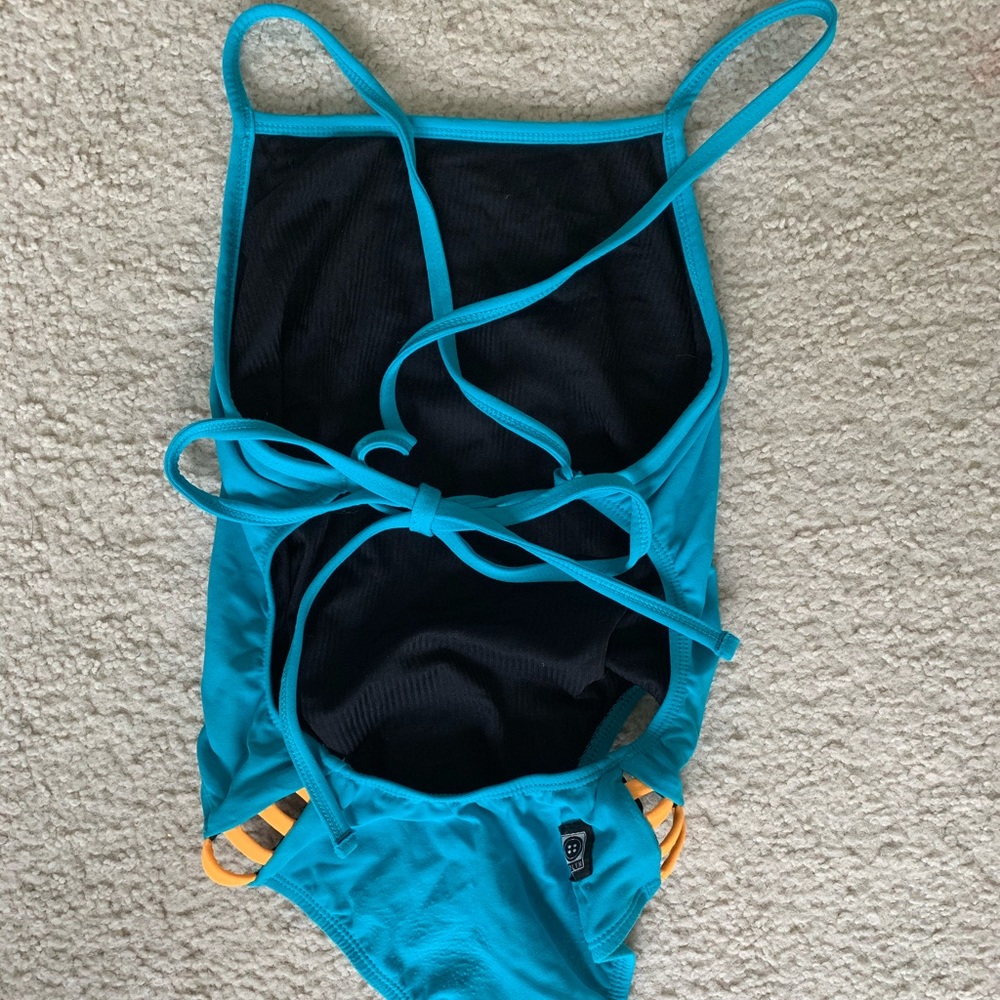 Jolyn Mateo Tie Back Onesie